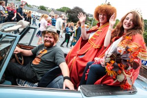 Denis Cronin driving the King of the Redheads 2015 Alan Reidy  From Blennerville, Co. Kerry and Queen of the Redheads 2015 Graine Keena from Fermoy at the Irish Redhead Convention this weekend in Crosshaven, Co. Cork. The Convention is a whacky, ginger-loving celebration of all things to do with red hair, while also raising awareness and funds for the Irish Cancer Society. Events included the crowning of the Redhead King & Queen,  gingerbread man party, carrot tossing championships, ginger speed-dating, seminars, exhibitions and much more all themed around red hair. To find out more visit redheadconvention.ie  Photo: Rory Coomey