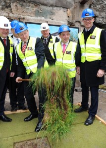 An Taoiseach Enda Kenny turning the sod at the site of the old Capitol cinema complex in Cork yesterday. Photo Billy macGill.