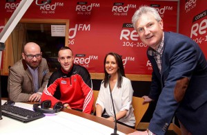 REPRO FREE - NO REPRODUCTION FEE. 29/02/2016. Cork's RedFM reach agreement with GAA for additional reporting rights Launch, in the new RedFM Studio, at RedFM Studios, Curraheen Road, Cork. Pictured are Ruairi O'Hagan and Lisa Lawlor, Cork's RedFM The Big Red Bench with Stephen McDonnell, Cork Gaa Senior Hurling Captain and Kieran Kingston, Cork Gaa Senior Hurling Manager, in the new RedFM Studio. Picture: Jim Coughlan. Press Release: Cork's Red FM reach agreement with GAA for additional reporting rights. Immediate release In association with the Gaelic Athletics Association, Cork's Red FM is delighted to announce that it has secured additional access to, and reporting rights for all Cork GAA matches. The station had previously been permitted to enter locally hosted National League and Munster Championship fixtures, but will now receive full press accreditation for all games involving Cork GAA. The station will now be in a position to provide live on-air updates from games, and will have access to the post-match press conferences. This successful application is testament to the stations continued dedication to Gaelic Games coverage, consistent growth in on-air output and online activity, including the proud sponsorship of the Red FM Senior Hurling League.   Cork Senior Hurling and Football Captains, Stephen McDonnell and Paul Kerrigan, along with Hurling Manager Kieran Kingston and Football Selector Eoin O’Neill were on hand to help in the launch of this new deal. It comes ahead of a bumper weekend of Gaelic Games coverage this weekend where Cork's Red FM will provide updates from the National League double header featuring Cork versus Dublin on Saturday, before full coverage of the All Ireland Camogie Club Finals featuring Milford, at GAA Headquarters on Sunday. Commenting on the new Rights, Cork's Red FM CEO Diarmuid O'Leary has said "Corks Red FM are delighted to be further extending our coverage of the inter-county teams for both men and women. We look fo