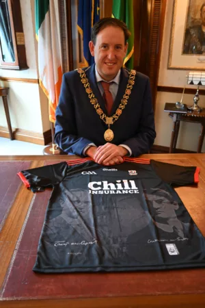 Lord Mayor of Cork Cllr. Kieran McCarthy with Cork commemorative jersey with formers Lords Mayor Tomás MacCurtain and Terence MacSwiney.