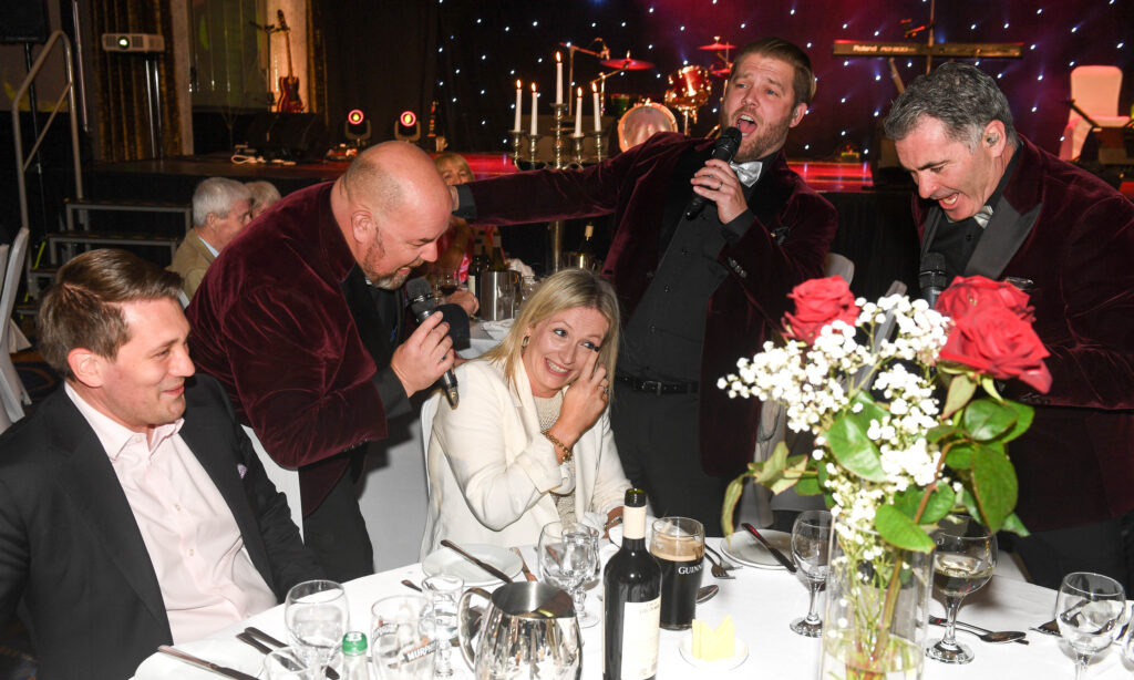 Niall Kingston and Michelle O’Flynn enjoying the performance of The Three Tenors at the Éire Óg GAA Club celebrations at the Rochestown Park Hotel. Picture: David Keane