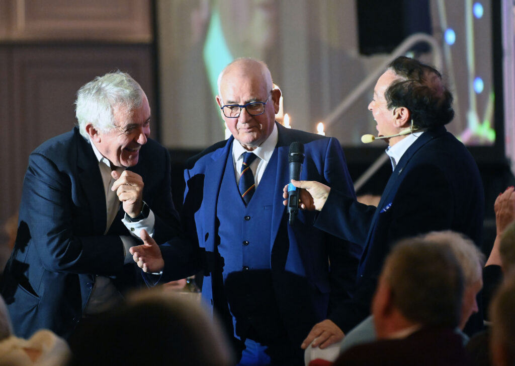 Michael O’Flynn and Pat Malone with Marty Morrissey at the Éire Óg GAA Club celebrations at the Rochestown Park Hotel.